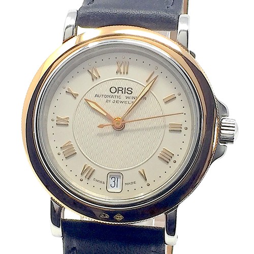 Oris 18kt - &,